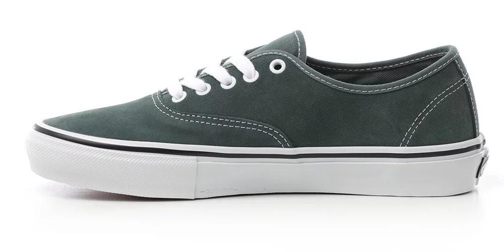 green black and white vans